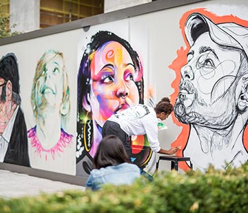 Faces of the Community artist installation across Principal Place Piazza - 2018.
