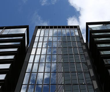 Building façade with blue sky.